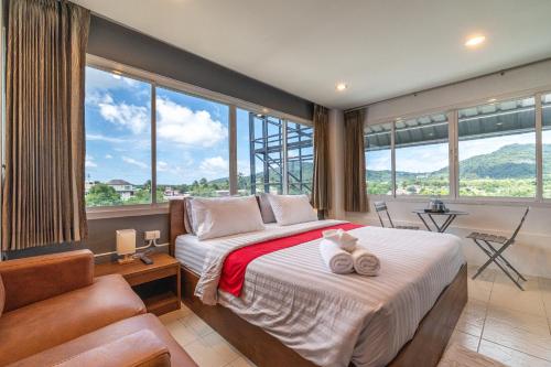 Katil atau katil-katil dalam bilik di Phuket Five For tune Holiday Hotel