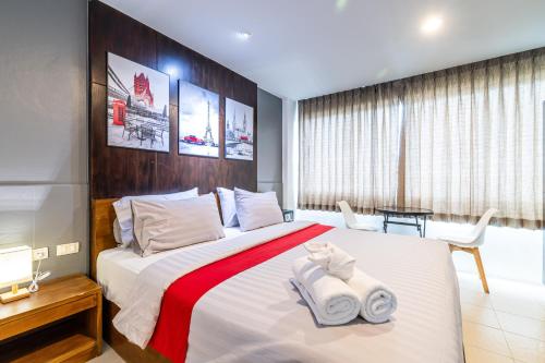 Katil atau katil-katil dalam bilik di Phuket Five For tune Holiday Hotel