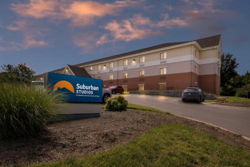 a building with a sign in front of a building at Suburban Studios Brentwood - Nashville in Brentwood