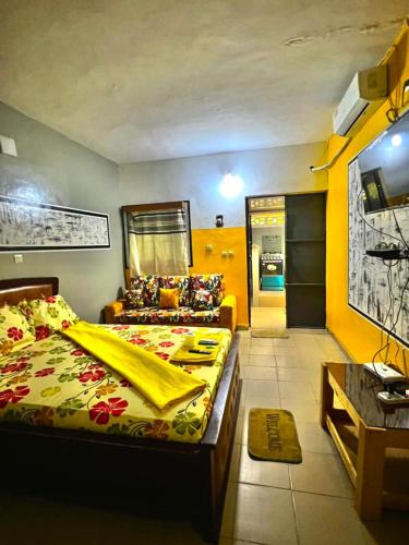 Ένα ή περισσότερα κρεβάτια σε δωμάτιο στο Les résidences Jacky