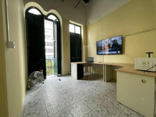 Μια τηλεόραση ή/και κέντρο ψυχαγωγίας στο Lapa Hostel 181