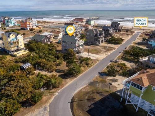 an aerial view of a beach town with the ocean at 8076 - Siren's Serenade in Rodanthe