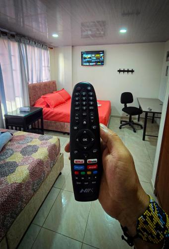 TV a/nebo společenská místnost v ubytování Fly & Stay Bogota APT 1