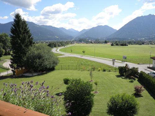 a view of a park with mountains in the background at Haus Sonnblick in Wangle