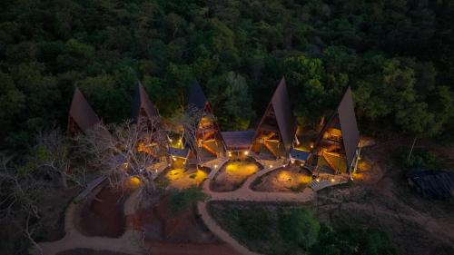 an aerial view of a building with lights on it at Wilpattu Safari Resort in Wilpattu
