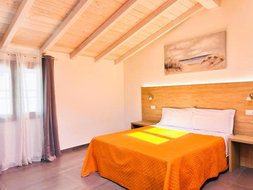 Postel nebo postele na pokoji v ubytování Longevity Hotel