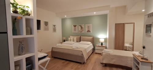 Postel nebo postele na pokoji v ubytování Monolocale Sicily