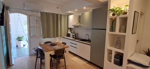 Kuchyň nebo kuchyňský kout v ubytování Monolocale Sicily