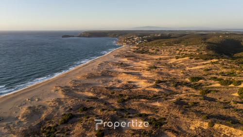 an aerial view of a beach near the ocean at Il terrazzo sulla duna 4 Torre dei Corsari in Torre Dei Corsari