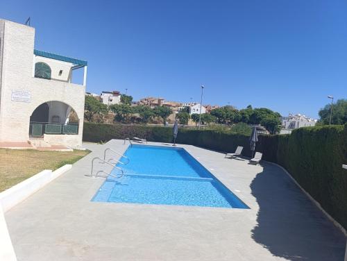 Πισίνα στο ή κοντά στο azahar playa apartmento