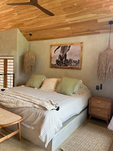 Una cama o camas en una habitación de Las chozas I