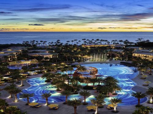 an aerial view of a resort with a fountain at Pullman Phu Quoc Beach Resort in Phu Quoc