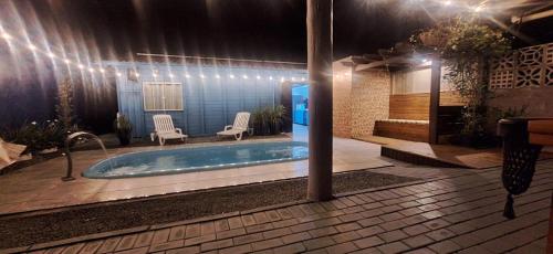 Πισίνα στο ή κοντά στο Casa com Piscina e Área Gourmet 3 Quartos na Praia