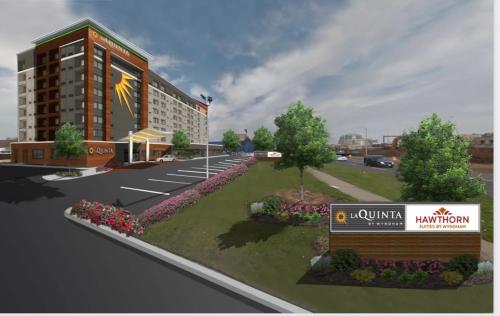 a rendering of a hotel with a parking lot at La Quinta by Wyndham New Haven in New Haven