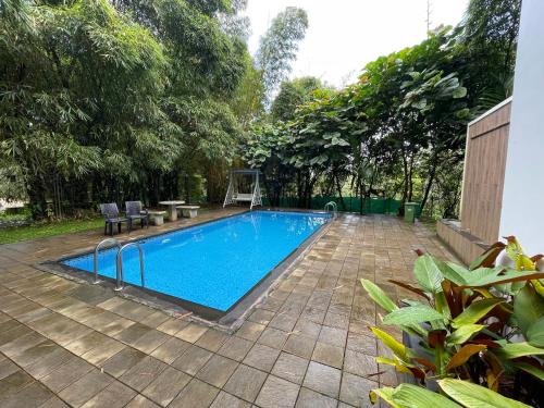 Le Eden Premium Wayanad Pool Resortの敷地内または近くにあるプール