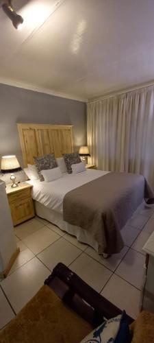 Ένα ή περισσότερα κρεβάτια σε δωμάτιο στο Magnolia Guesthouse