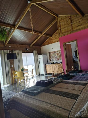 Una cama o camas en una habitación de Moçamba