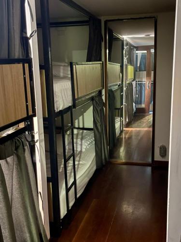 a group of bunk beds in a room at Unicentro Rooms Inn by Saint Michel in Bogotá