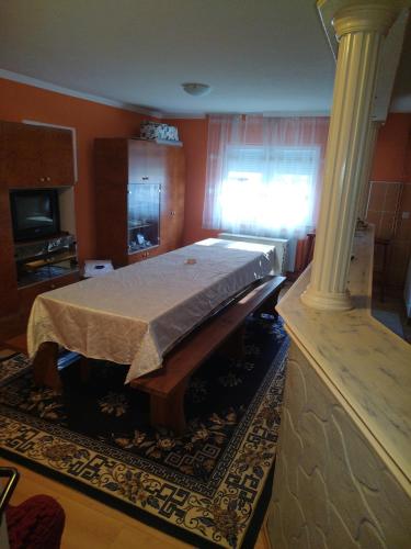 a bedroom with a bed in a room at Stefke in Lučani