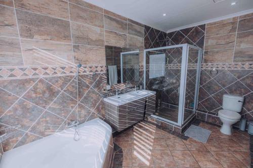 Bilik mandi di Beach Penthouse in Mtwalume