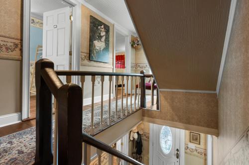 a staircase in a home with a stair case at McTernan Manor in Franklin