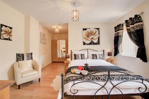 Voodi või voodid majutusasutuse Smithy Cottage toas