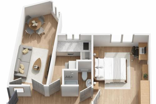 Ένα ή περισσότερα κρεβάτια σε δωμάτιο στο Michaud Charming apartment near Paris