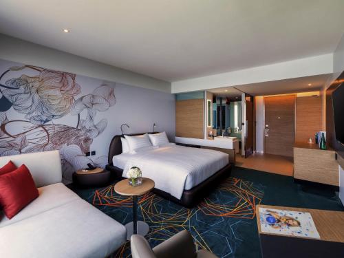 Letto o letti in una camera di Novotel Marina Sriracha