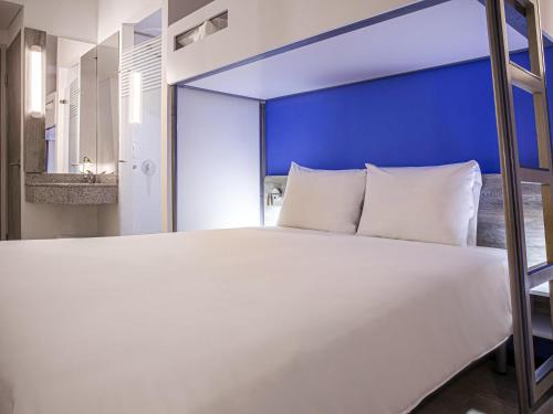 Un ou plusieurs lits dans un hébergement de l'établissement ibis budget Barranquilla