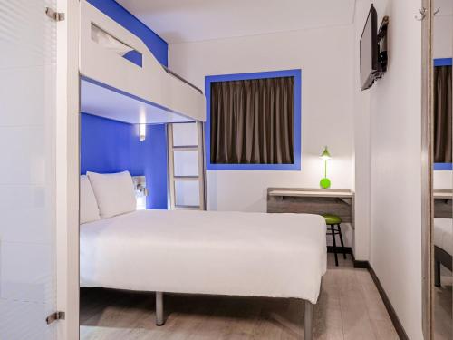 Un ou plusieurs lits dans un hébergement de l'établissement ibis budget Barranquilla
