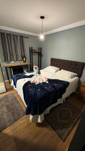Una cama o camas en una habitación de Tico Pousada