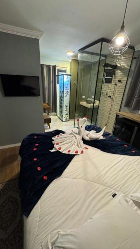Una cama o camas en una habitación de Tico Pousada