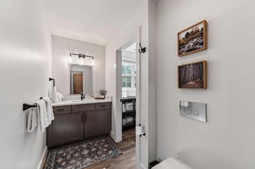 a bathroom with a sink and a mirror at Aska Acres in Greens Mill