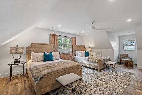 a bedroom with two beds and a rug at Aska Acres in Greens Mill