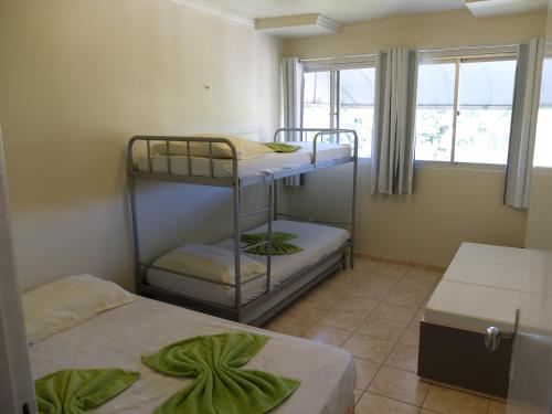 Un pat sau paturi într-o cameră la Cobertura Porto de Galinhas