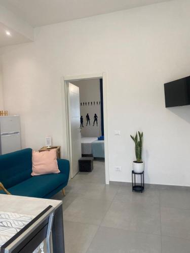 TV a/nebo společenská místnost v ubytování HERA'S HOME Pisa