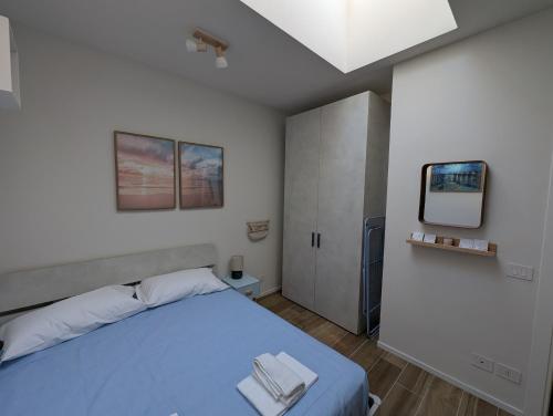 En eller flere senge i et værelse på Loft Vanchiglia