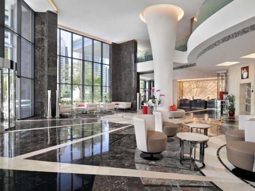 Гостиная зона в Mövenpick Hotel Apartments Downtown Dubai