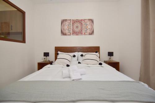 Ένα ή περισσότερα κρεβάτια σε δωμάτιο στο Le Joyau de Marchane