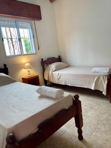 Giường trong phòng chung tại Juan Pablo