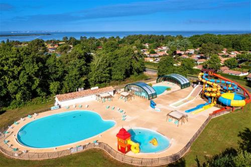 Πισίνα στο ή κοντά στο Chalet au coeur du bassin d' Arcachon avec accès gratuit Capfun