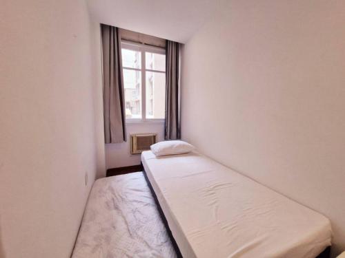 Katil atau katil-katil dalam bilik di SUH Copacabana 19 Spacious Near The Beach!
