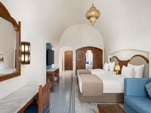 Voodi või voodid majutusasutuse Movenpick Resort Sharm El Sheikh toas