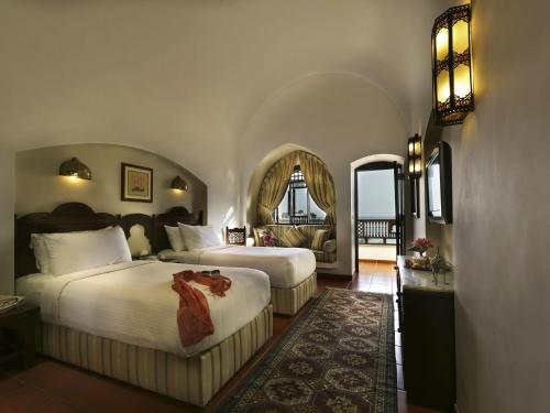 Voodi või voodid majutusasutuse Movenpick Resort Sharm El Sheikh toas