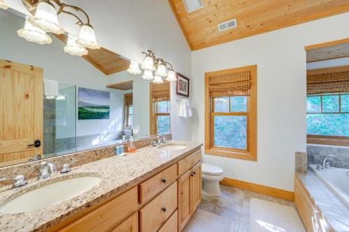 a bathroom with two sinks and a tub and a toilet at Golf, Hike and Trout Fish Mtn-View Cashiers Retreat in Norton
