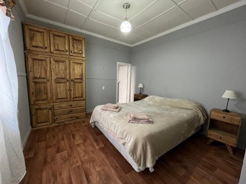 Ένα ή περισσότερα κρεβάτια σε δωμάτιο στο Inmuebles V&S - Casita Alberdi