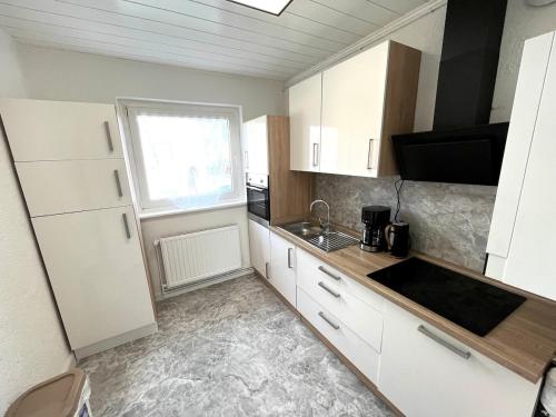 Η κουζίνα ή μικρή κουζίνα στο Stillvolle Wohnung