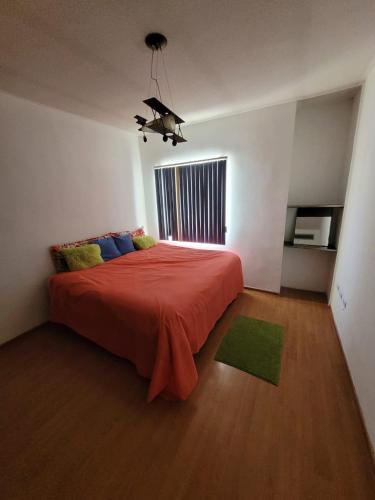 Ένα ή περισσότερα κρεβάτια σε δωμάτιο στο VIVELE Home