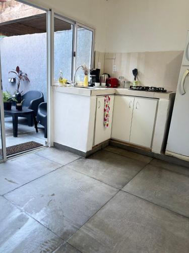 a kitchen with a sink and a counter top at El Descanso in Posadas