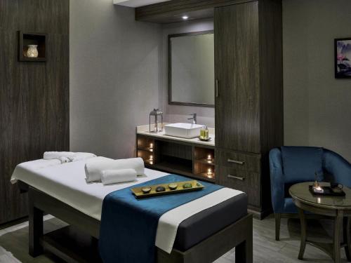 Movenpick Hotel Qassimにあるベッド